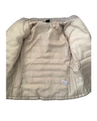 Beige puffer jacket on a white background