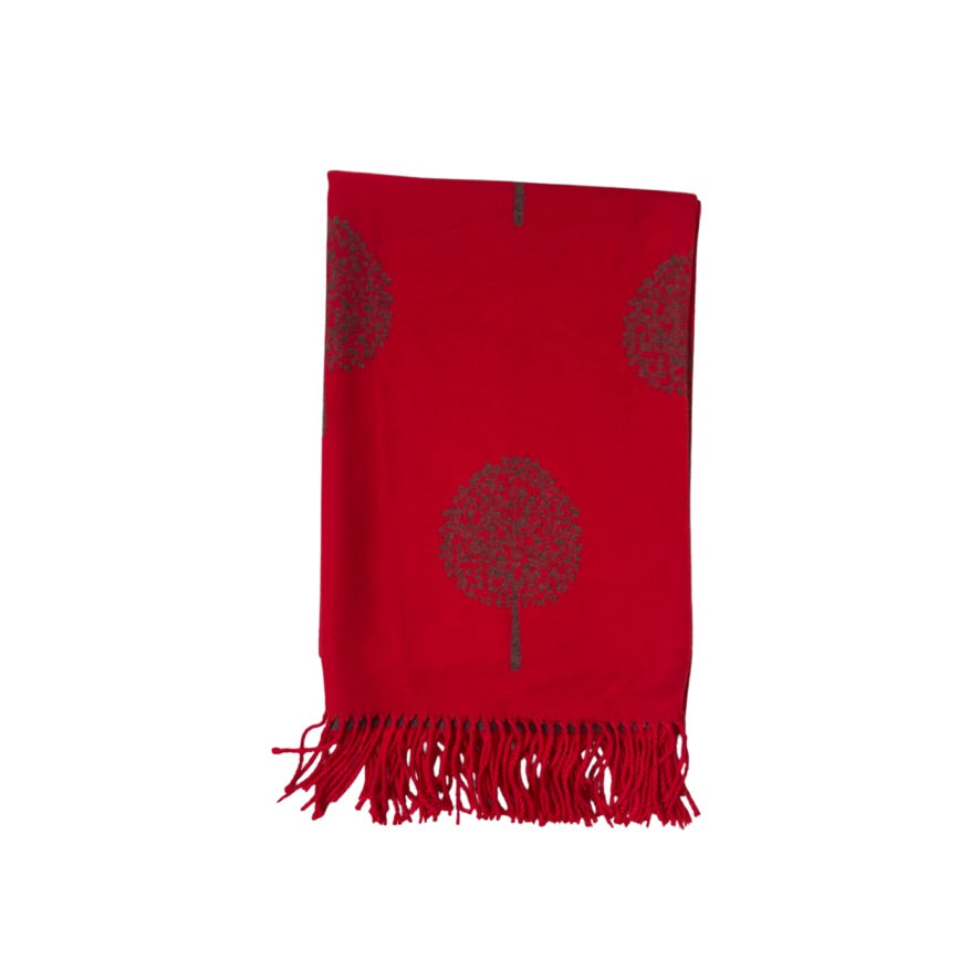 Red scarf with tree design and fringes on a white background