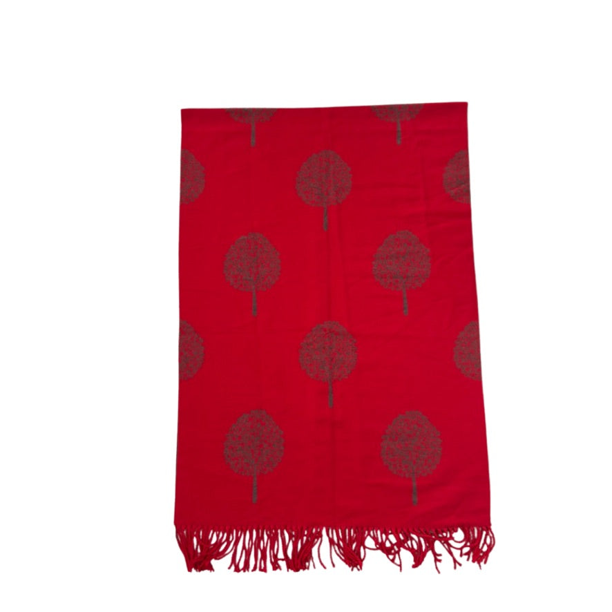 Red scarf with tree pattern and fringes on a white background