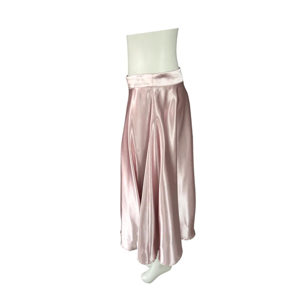 Pink satin skirt with white top on a white background