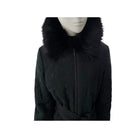 Black coat with fur collar on a mannequin against a white background