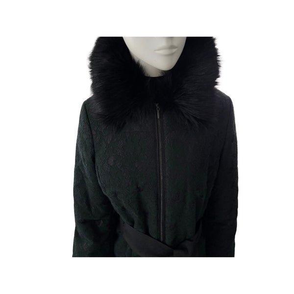 Black coat with fur collar on a mannequin against a white background