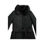 Black coat with fur hood on a white background