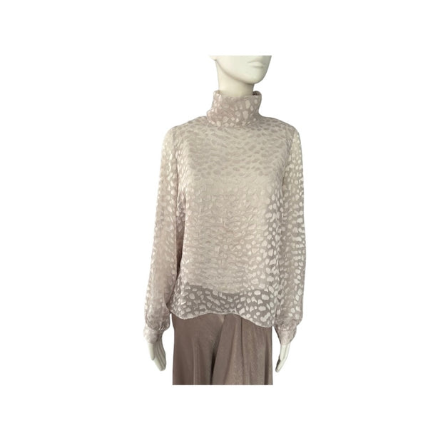 Mannequin wearing a beige turtleneck sweater on a white background