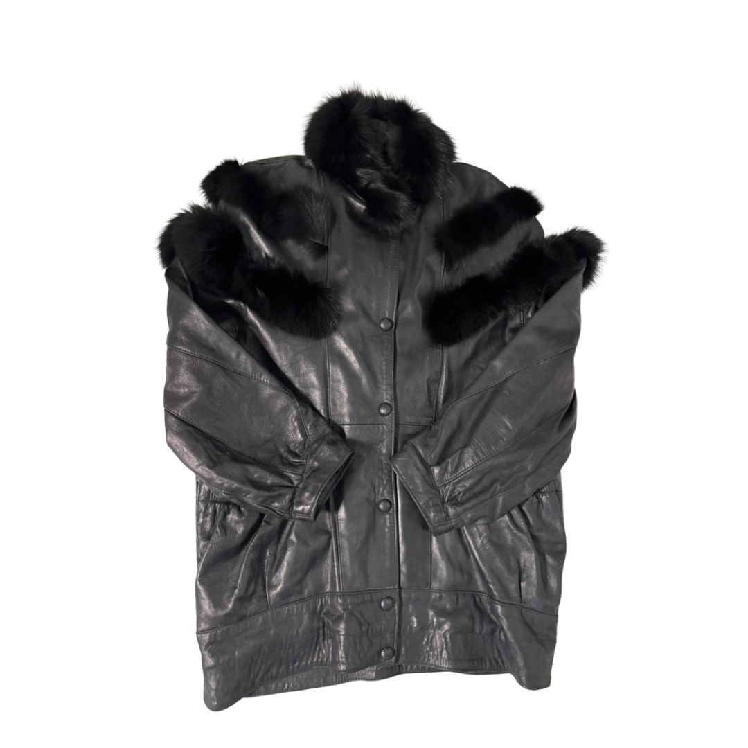 Black leather jacket with fur trim on a white background