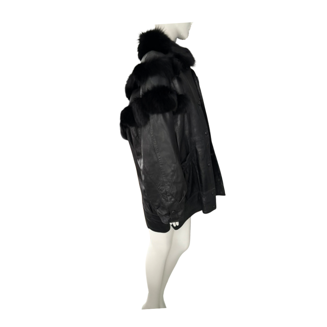 Black leather coat with fur collar on a mannequin against a white background