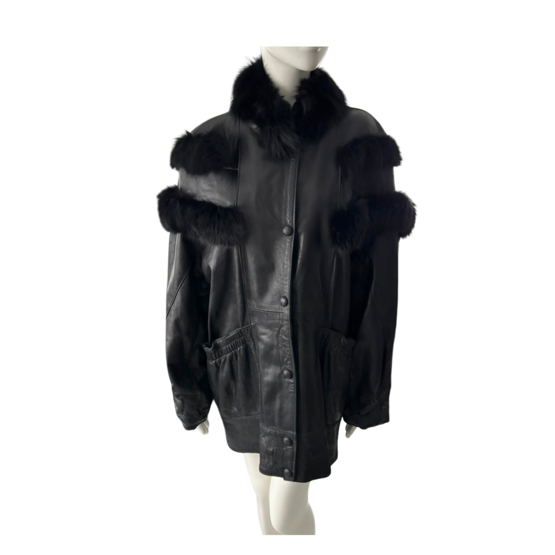 Black leather jacket with fur trim on a mannequin against a white background