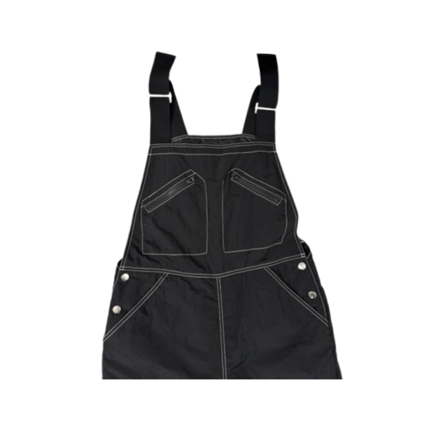 Black apron with white buttons on a white background