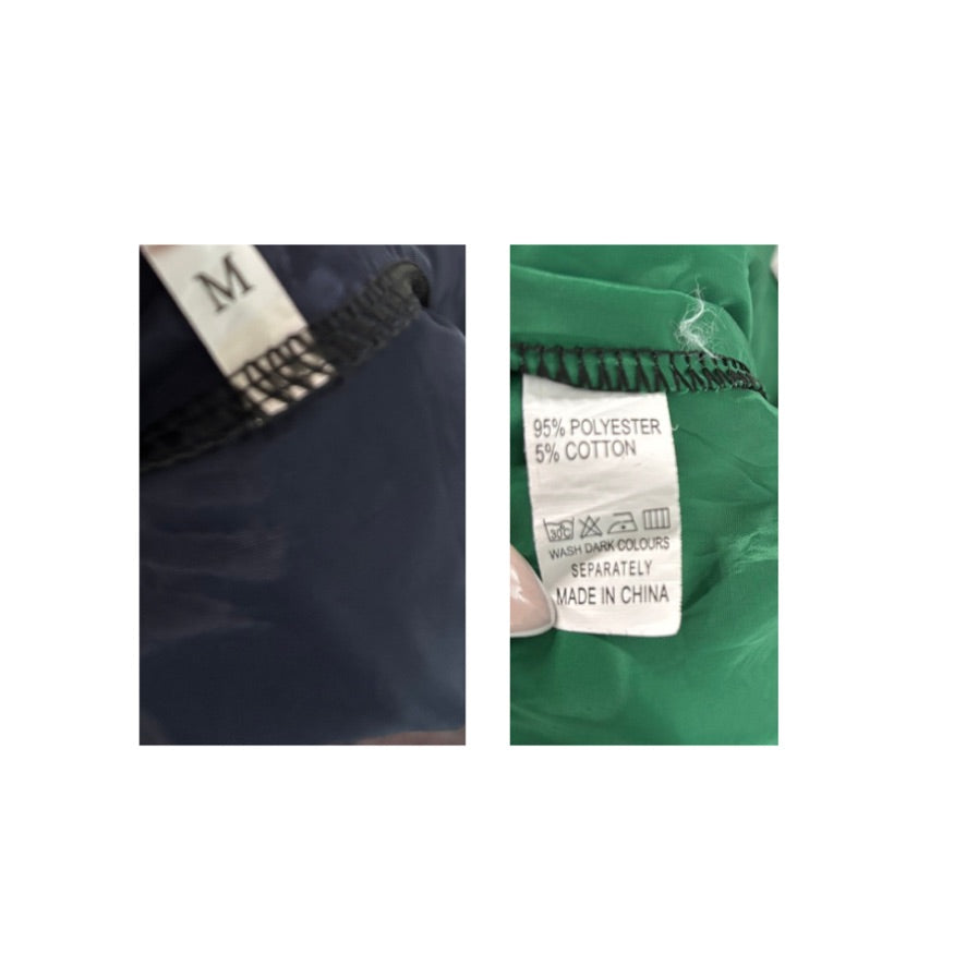 Close-up of clothing labels on a white background