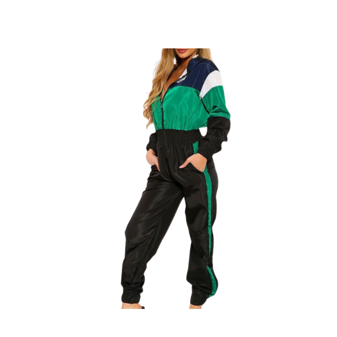 Woman wearing a colorful tracksuit on a white background