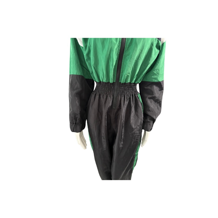 Green and black raincoat on a white background