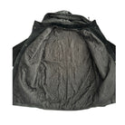 Black quilted jacket lining on a white background