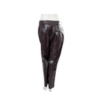 Brown leather pants on a white background