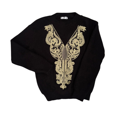 Black sweater with gold embroidery on a white background