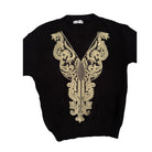 Black sweater with gold embroidery on a white background