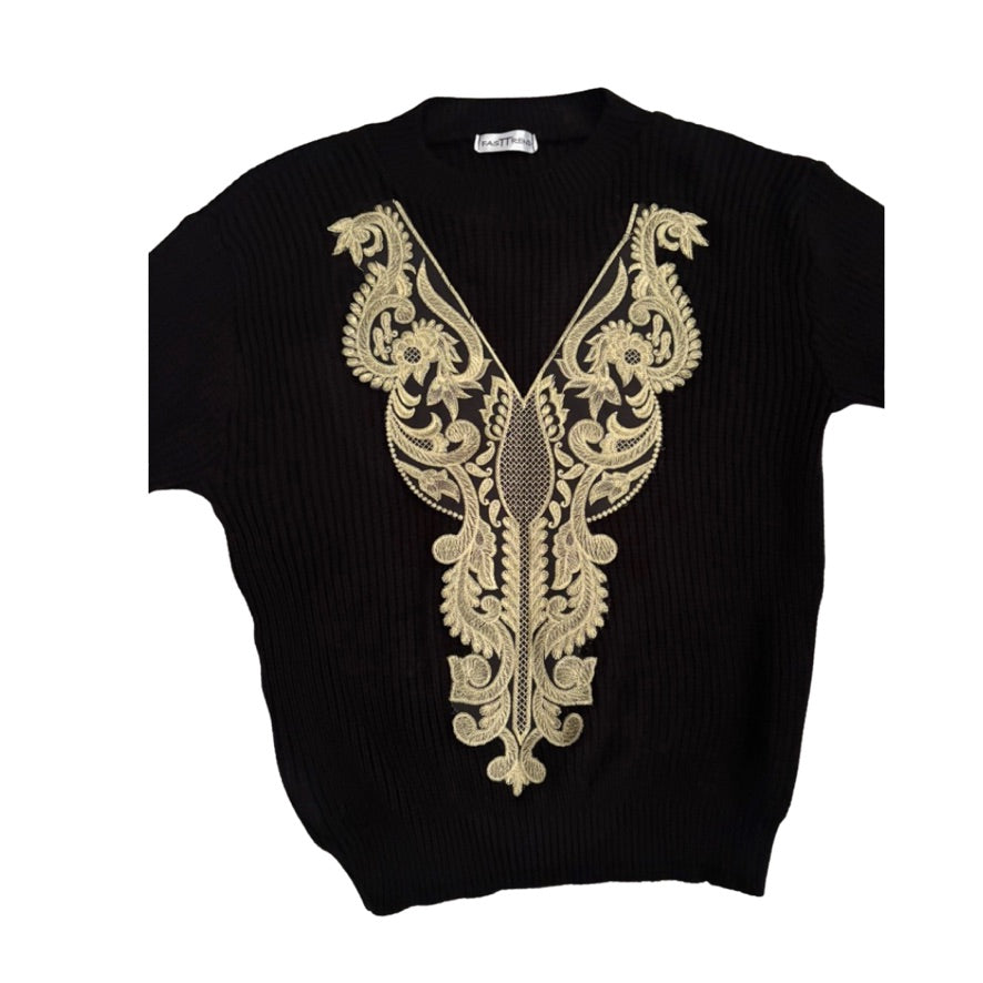 Black sweater with gold embroidery on a white background