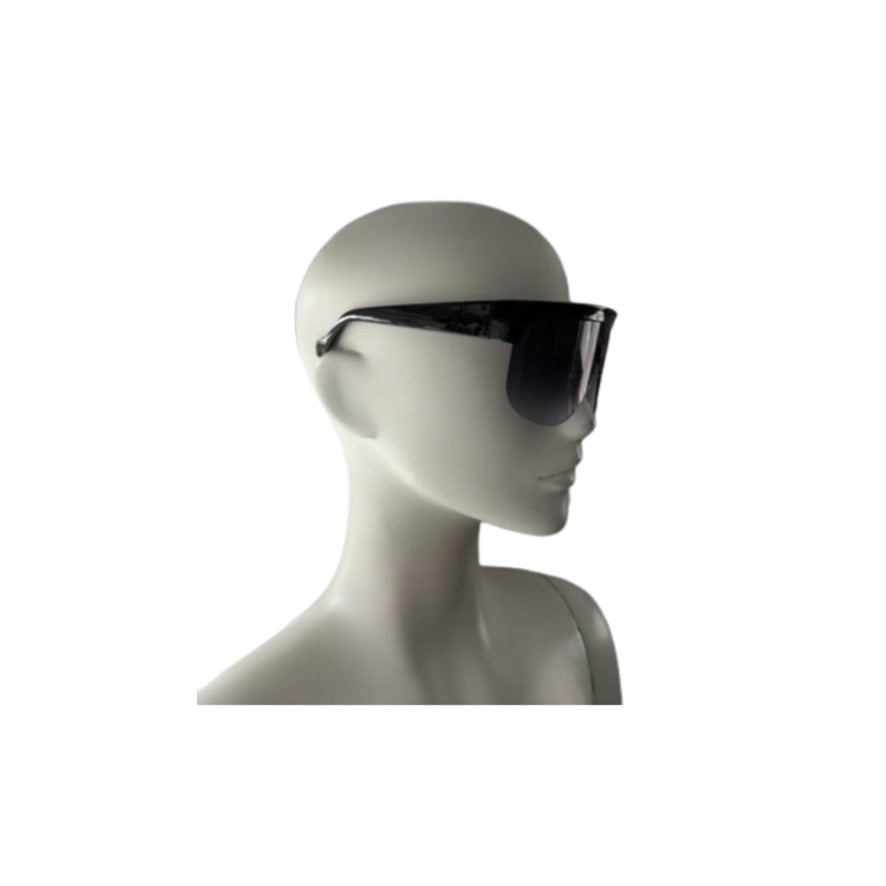 Black sunglasses on a mannequin head against a white background