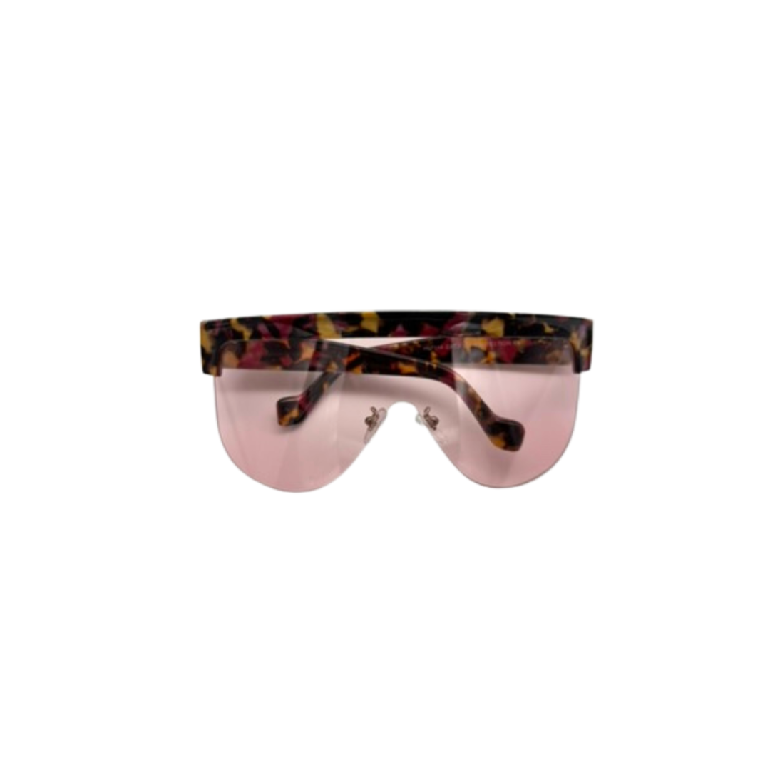 Sunglasses with a colorful tortoiseshell frame on a white background