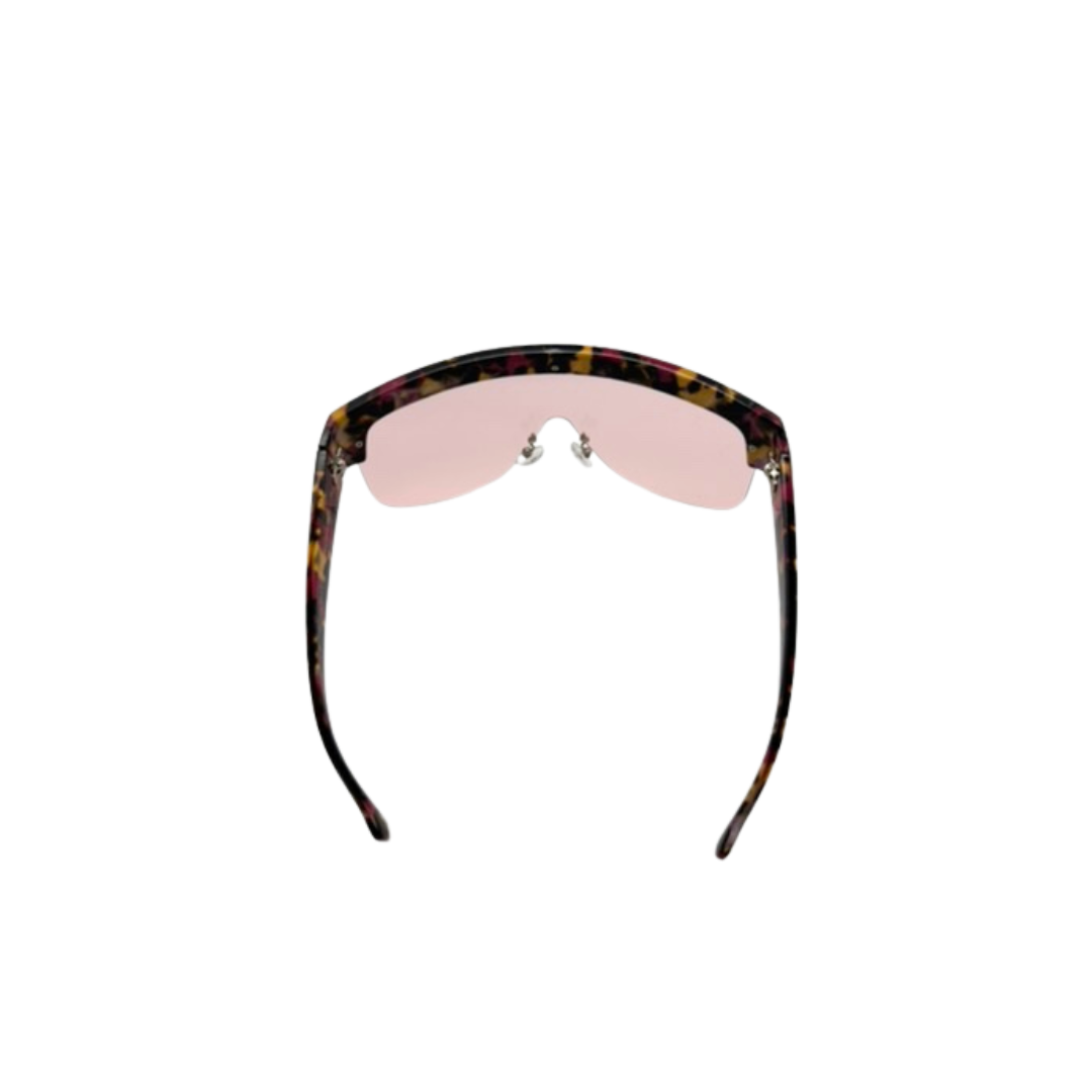 Sunglasses with a tortoiseshell frame and pink lenses on a white background