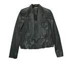 Green leather jacket on a white background