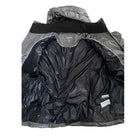 Black lining og grey puffer jacket with  on a white background