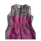 Pink and black dress with DKNY label on a white background