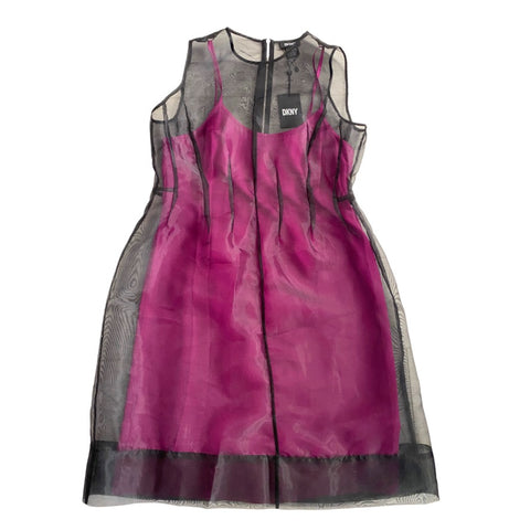 Pink dress with sheer overlay on a white background