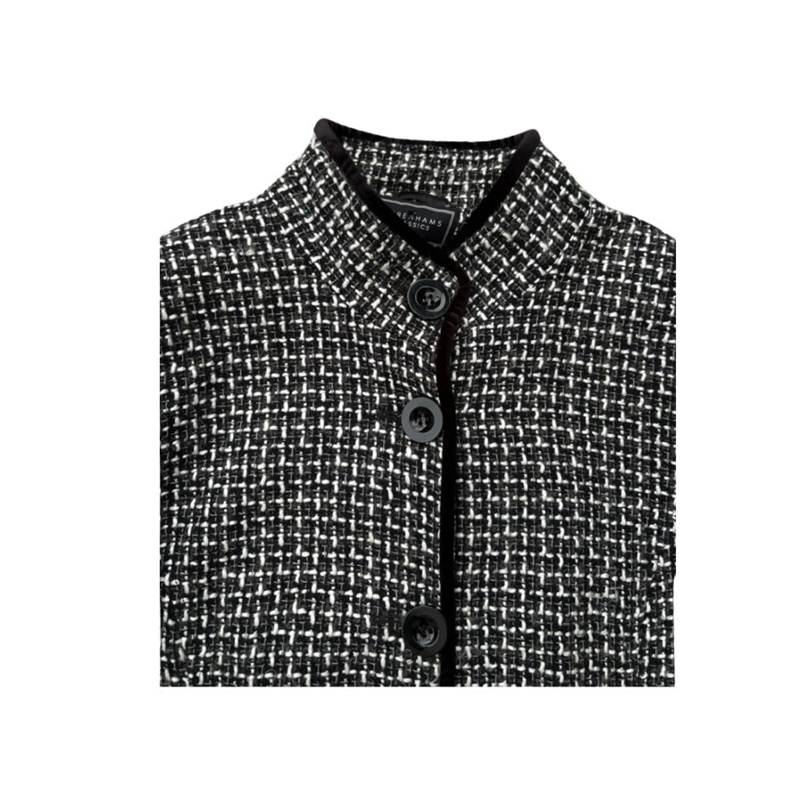 Black and white checkered jacket with buttons on a white background