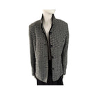 Houndstooth patterned blazer on a mannequin against a white background
