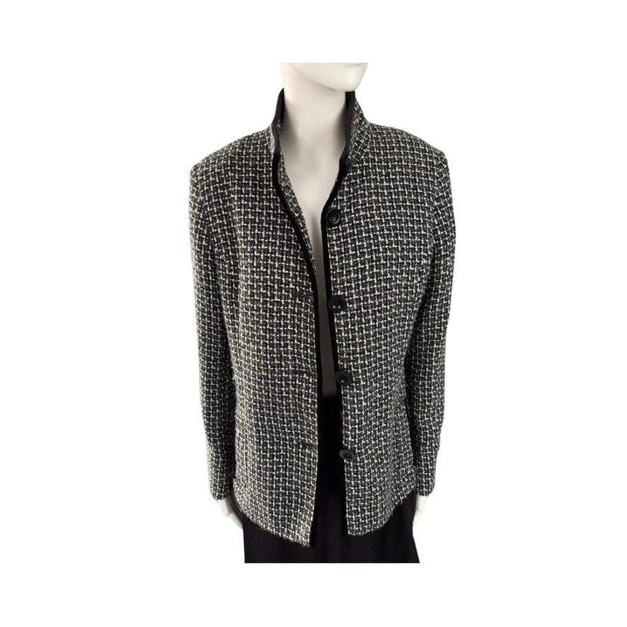 Houndstooth patterned blazer on a mannequin against a white background