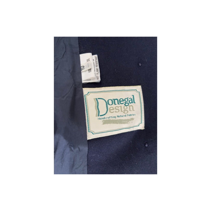 Navy fabric with a Donegal Design label on a white background