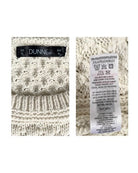Textile with Dunnes branding and care label on a white background