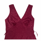 Maroon tank top with a subtle pattern on a white background