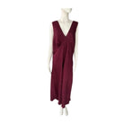Maroon dress on a mannequin against a white background