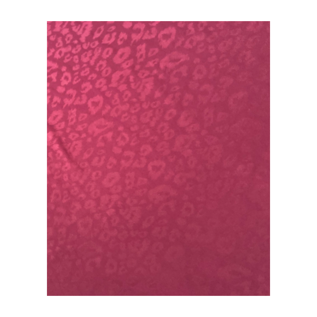 maroon fabric with a subtle pattern on a white background