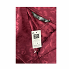 Maroon patterned fabric with a size tag and D&G label.