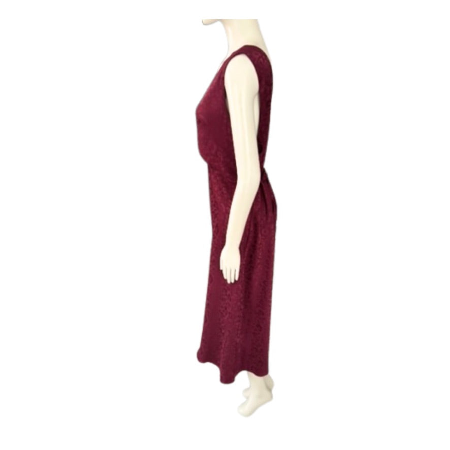 Maroon sleeveless dress on a mannequin against a white background