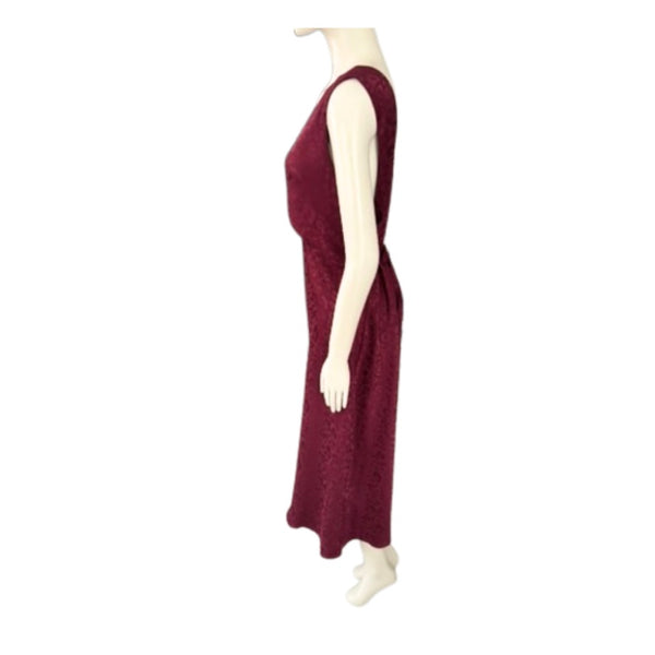 Maroon sleeveless dress on a mannequin against a white background