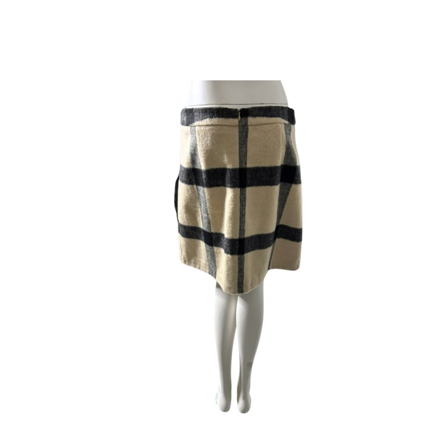 Plaid skirt on a mannequin against a white background