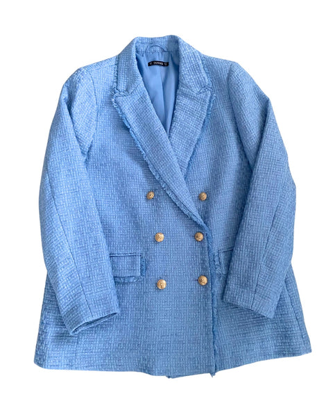 Blue blazer with gold buttons on a white background