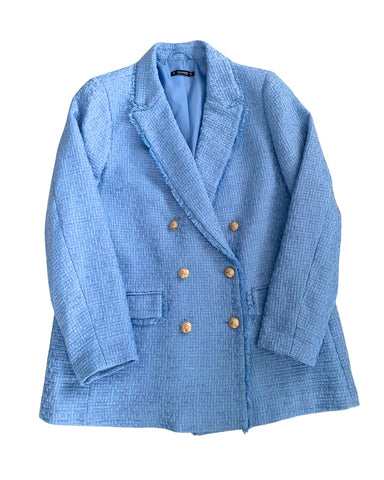 Blue blazer with gold buttons on a white background