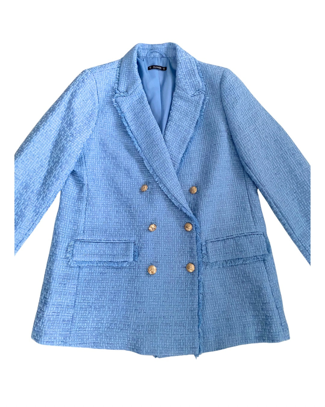 Blue blazer with gold buttons on a white background