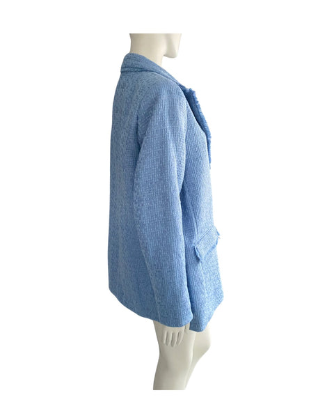 Blue textured sweater on a mannequin against a white background
