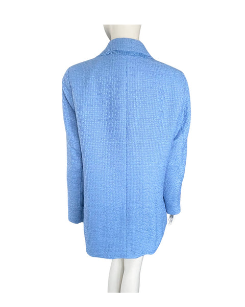 Light blue textured jacket on a mannequin against a white background