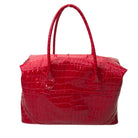 Red textured handbag on a white background