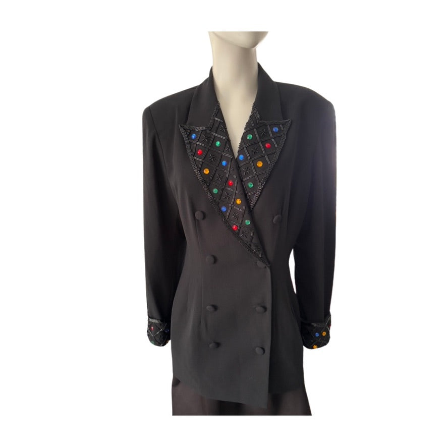 Black blazer with colorful gemstone embellishments on a mannequin against a white background