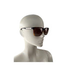 Sunglasses on a mannequin head against a white background