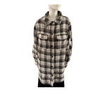 Plaid shirt on a mannequin against a white background