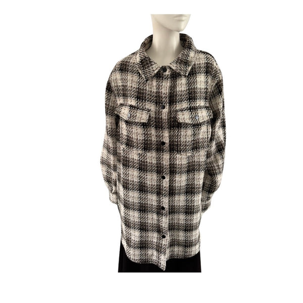 Plaid shirt on a mannequin against a white background