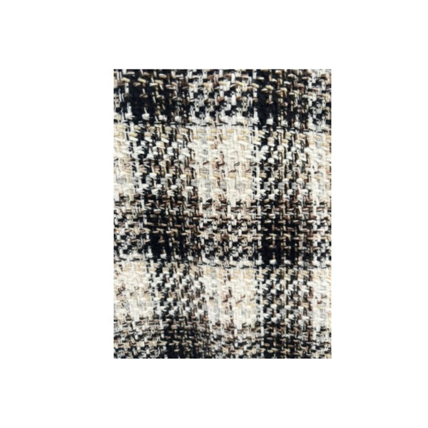 Textured fabric with black, white, and beige pattern on a white background